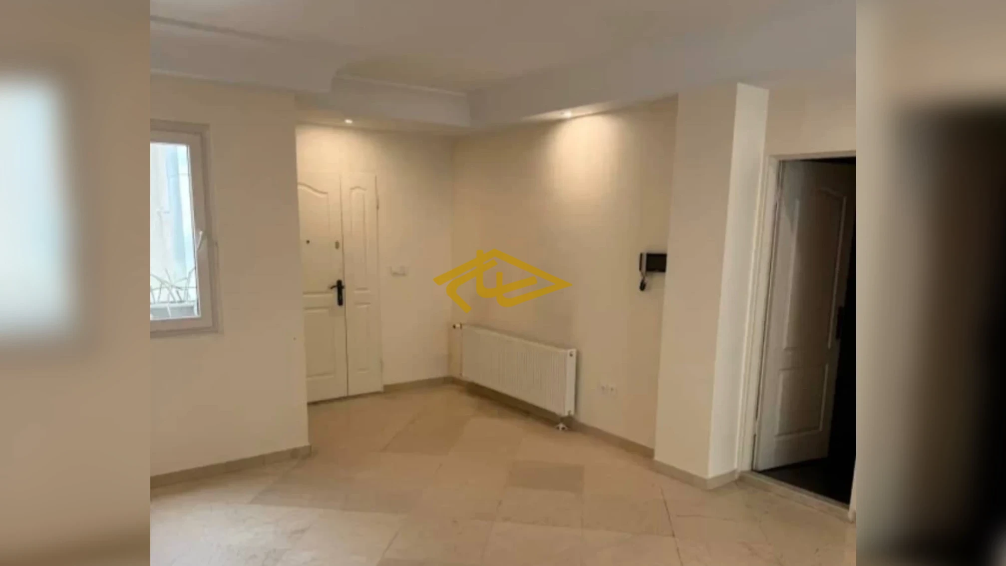 اجاره آپارتمان ۶۵ متری یک خوابه بازسازی شده در زعفرانیه خیابان پسیان | بالکن سبز | املاک ساسان